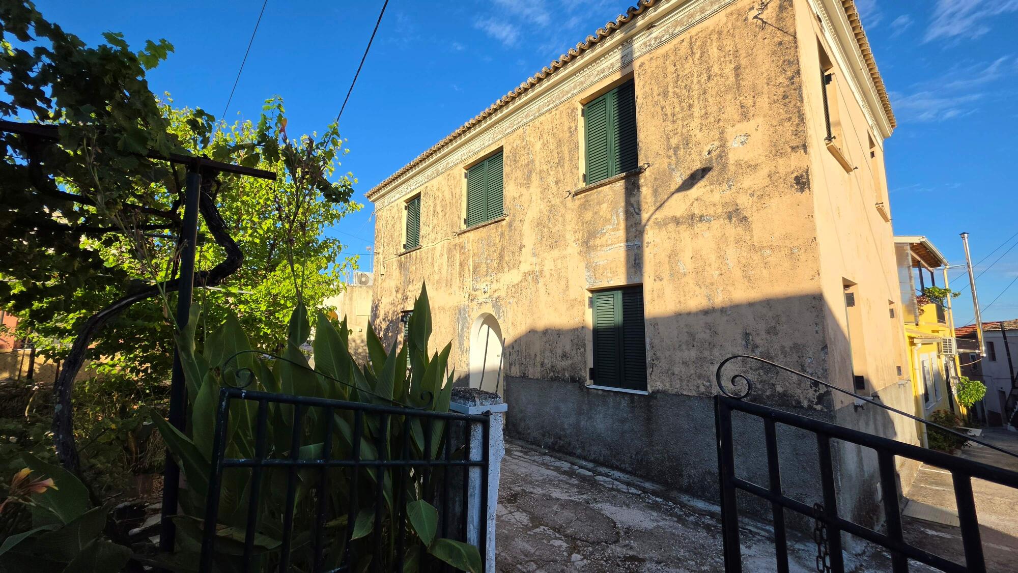 Exterior view of traditional stone property in Agioi Douli Corfu