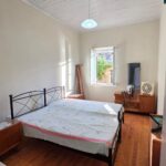 Bedroom in traditional stone house in Agioi Douli, Corfu