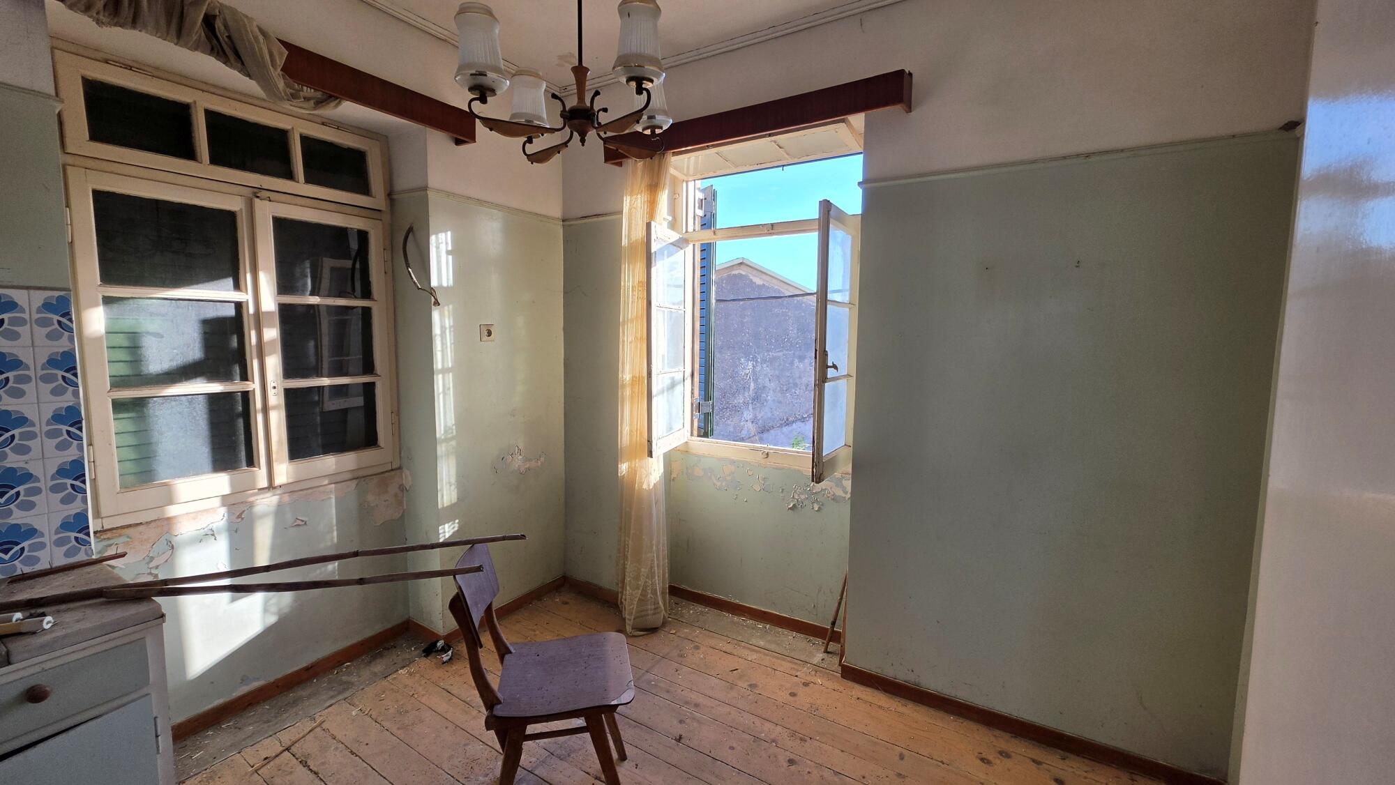 First floor kitchen and windows with views to the village