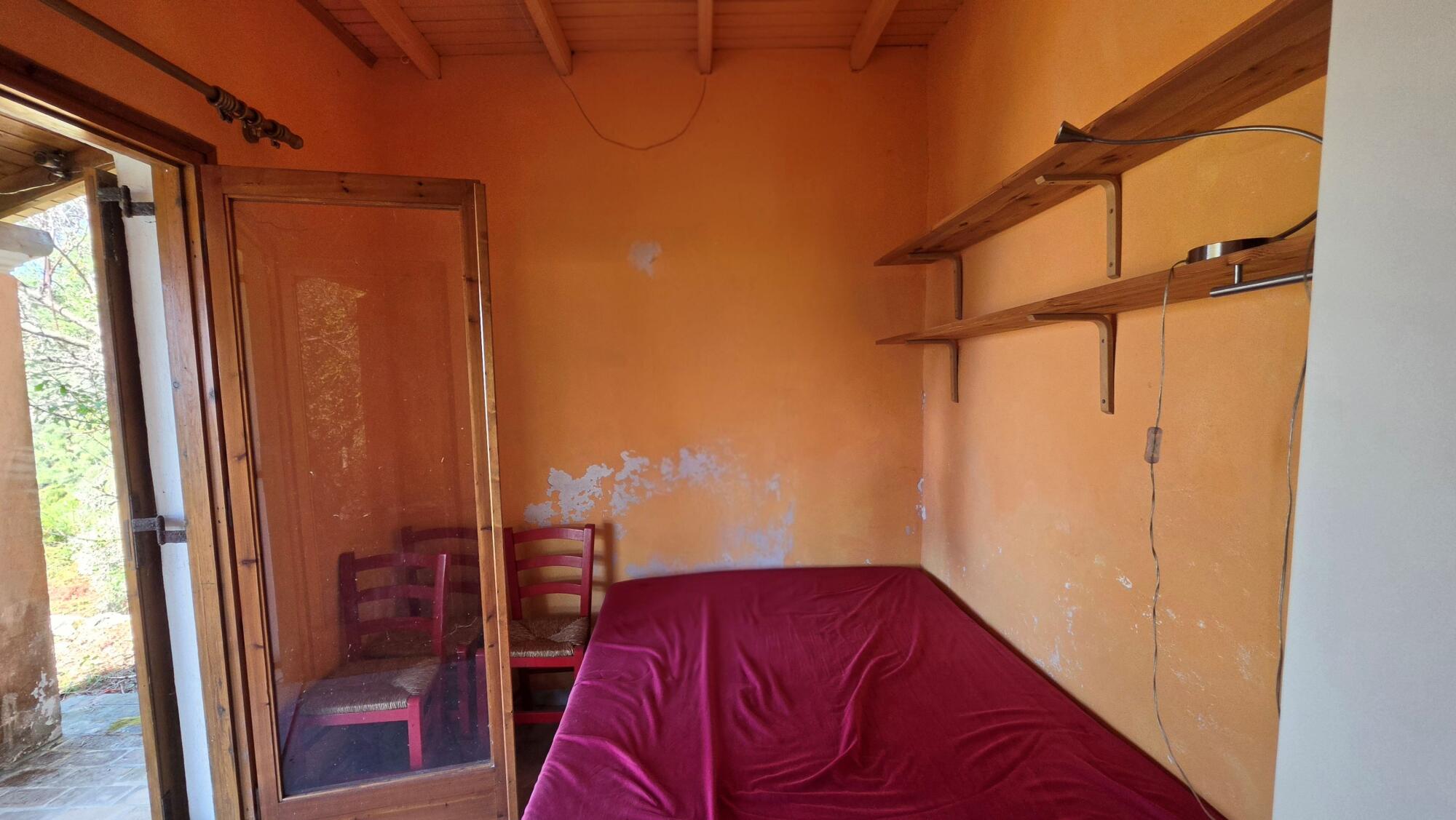 Second bedroom with access to the covered terrace