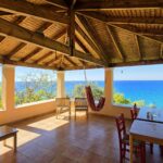 Covered terrace overlooking the Ionian Sea and sunset in Pentati Corfu